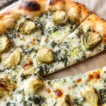 artichoke pizza with spinach parmesan cream sauce